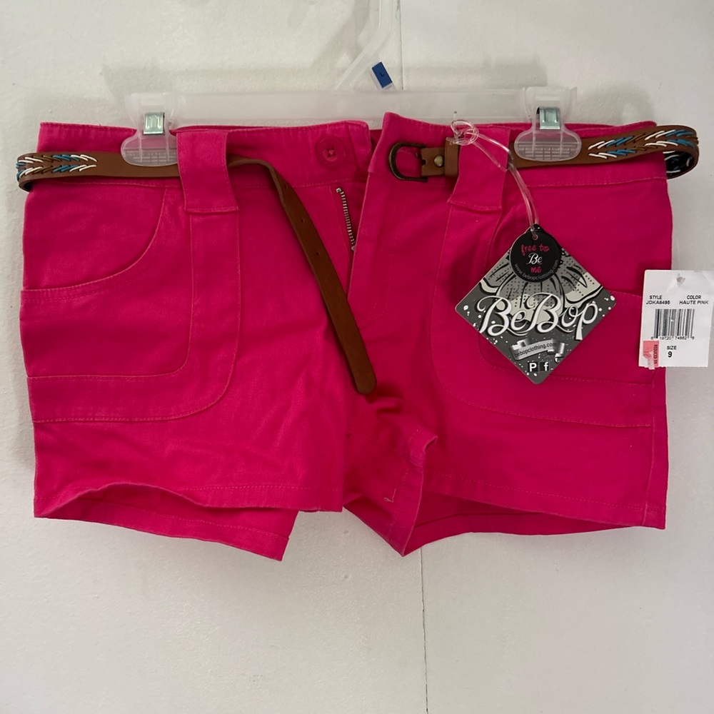 Size 9 women’s / juniors pink shorts. New with tags.